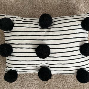 Pillow striped with Pom Pom